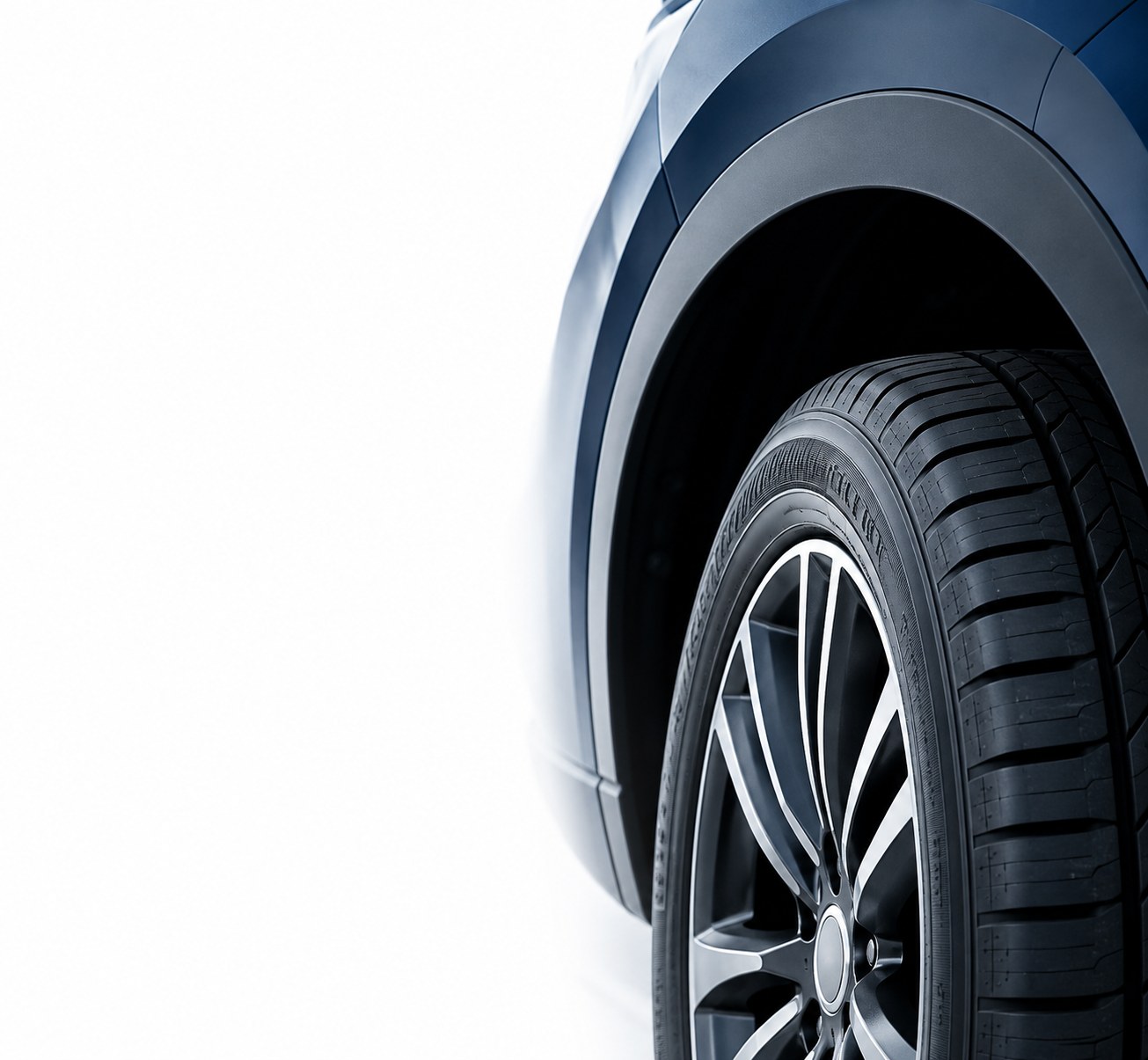 Tyre and wheel fitted close to the fender arch