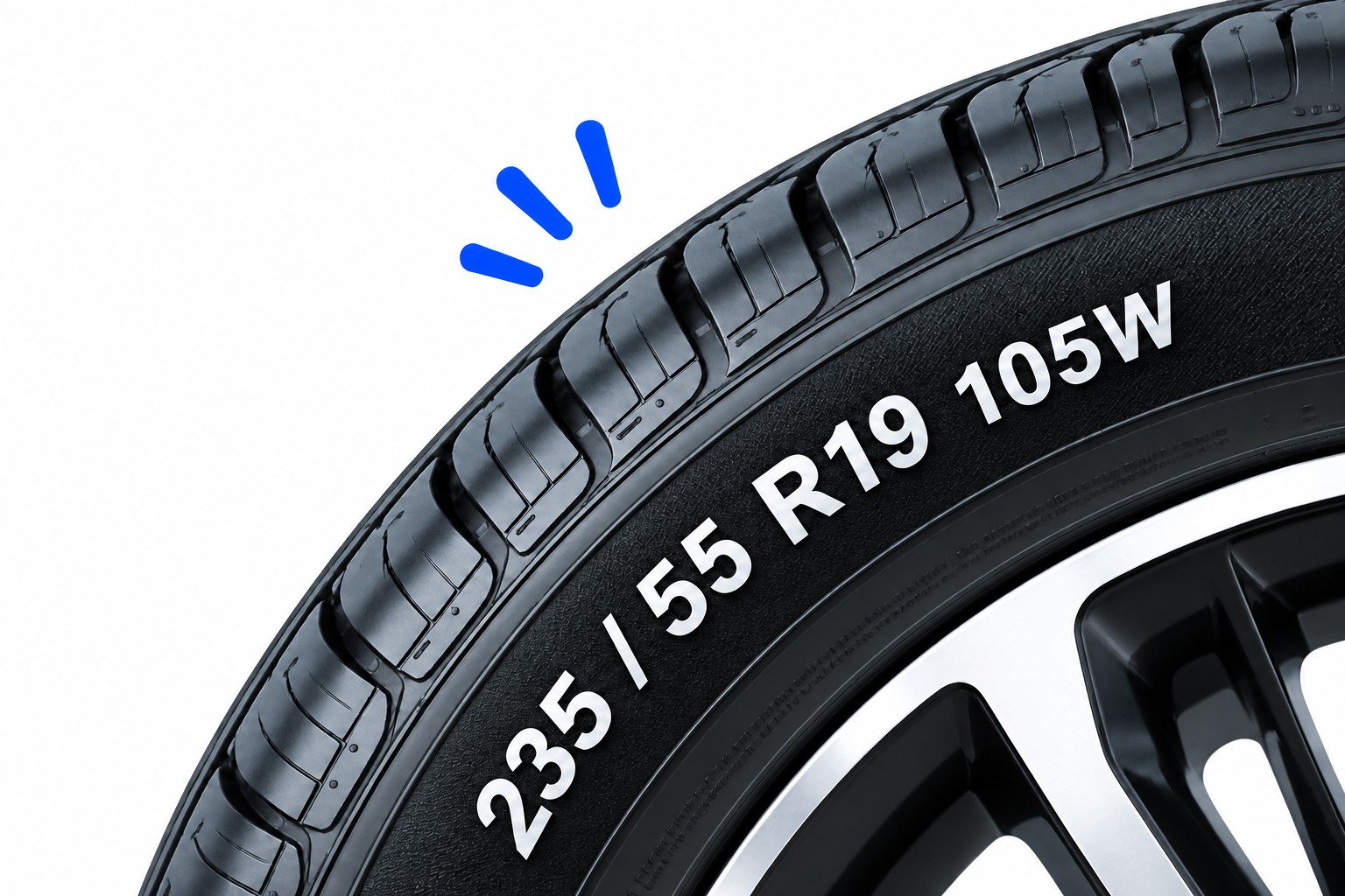 Close-up of a tyre sidewall showing the 235/55 R19 105W size markings